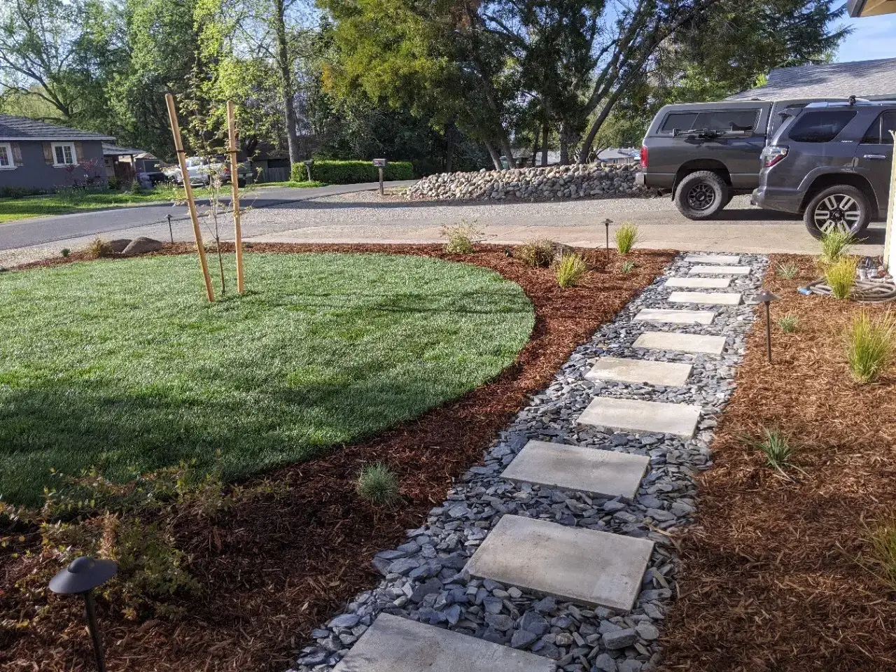 Paver landscape walkway with border plantings