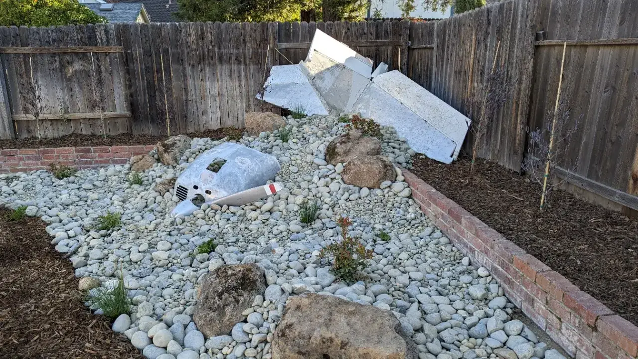 Backyard focal-point rock and tree feature in Granite Bay, CA
